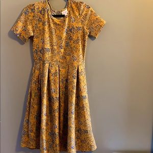 Lularoe yellow shortsleeved zip up dress.